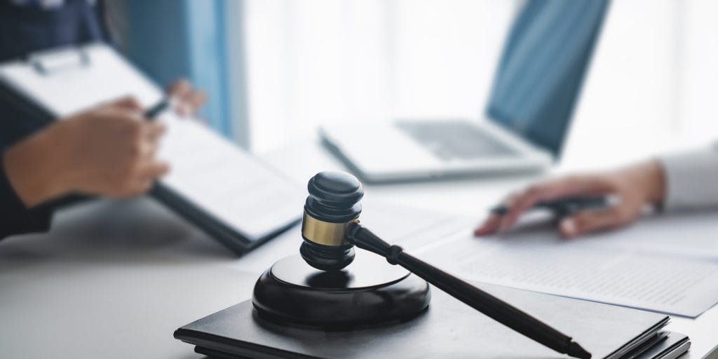 Bloomington Normal family law attorney koth gregory & nieminski law firm meeting with attorney to discuss alimony caluculation.