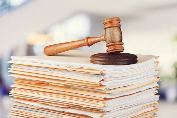 Bloomington-Normal family law attorneys from koth gregory & nieminski law firm working on documents for divorce and alimony case.