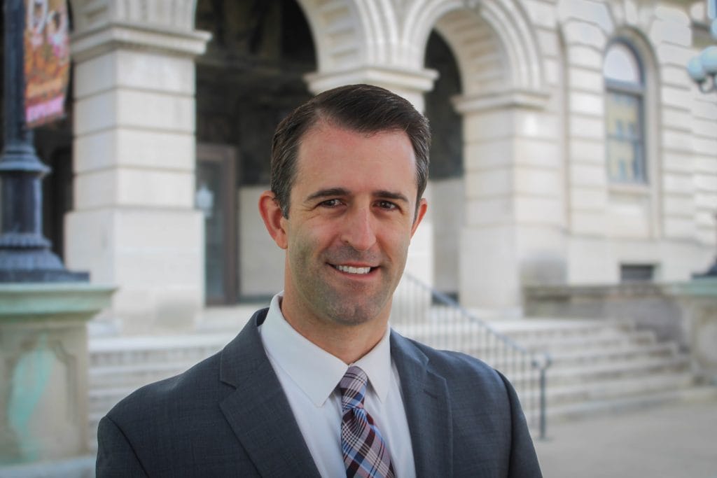 Bloomington-Normal Personal Injury Attorney Dustin Koth in front of McLean County Courthouse | Mistakes to Avoid After an Accident