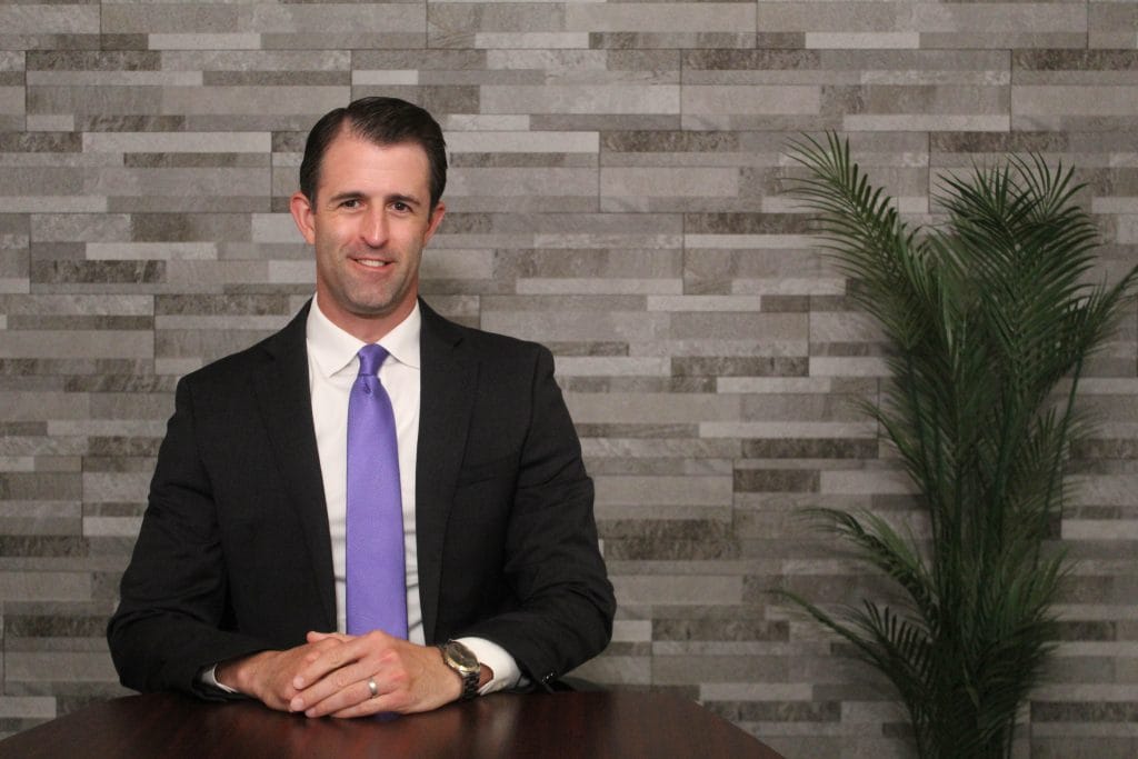 Bloomington-Normal Illinois Personal Injury Attorney Dustin Koth Koth Gregory & Nieminski Law Firm conference room in office in Downtown Bloomington Illinois 