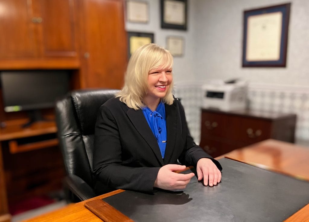 Bloomington-Normal Illinois expert family law attorney Kristin Nieminski, consulting with a client in office about how to possibly terminate maintence (alimony).