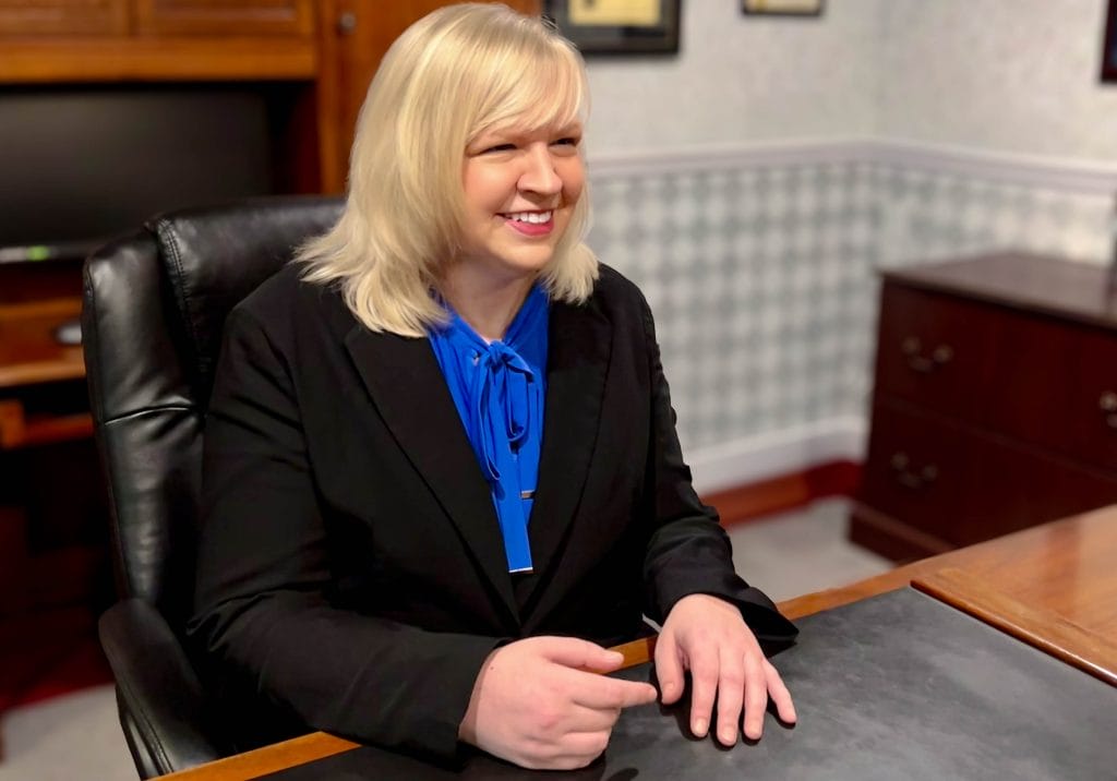 Bloomington-Normal Illinois Expert Family Law Attorney discussing alimony with a client.